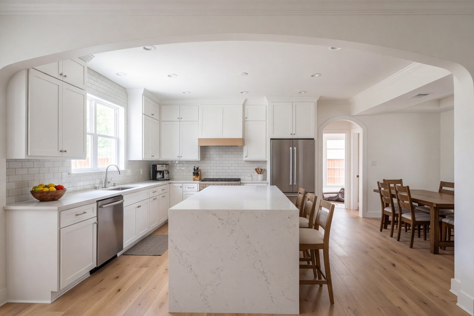 Seminary kitchen with a long island and wide opening to the dining room